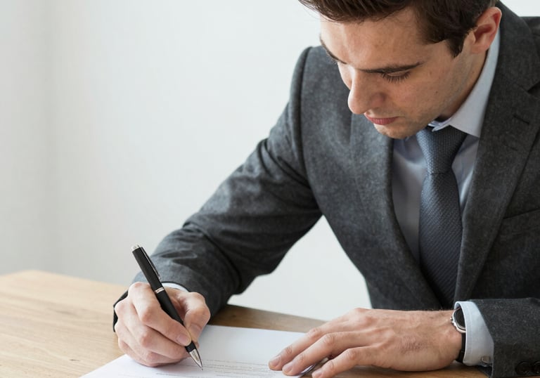 a man riding a skateboard down the side of a ramp