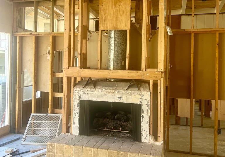 Custom electric fireplace installation with surround, hearth, and mantle — also offered as gas firep