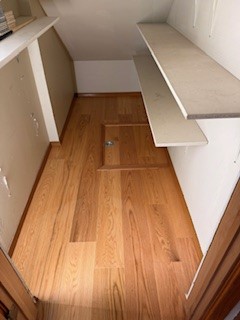 Installed new hardwood floors, repaired trap door, custom trim work in pantry