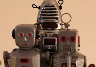 Retro robots showing ByBit’s built-in bots like DCA and Grid