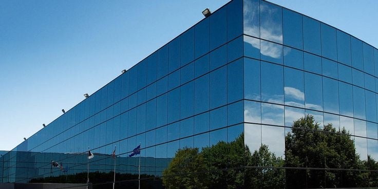 a building with a lot of windows and a sky view