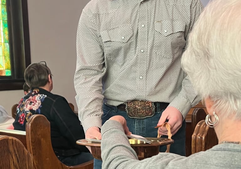 Moran United Methodist Church offering donations during Sunday's worship