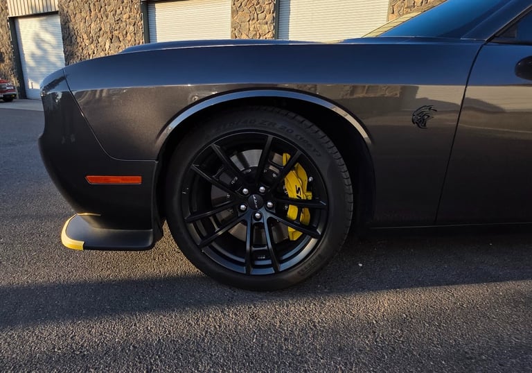 wheel showing a customized, freshly painted brake caliper by bluemax tint