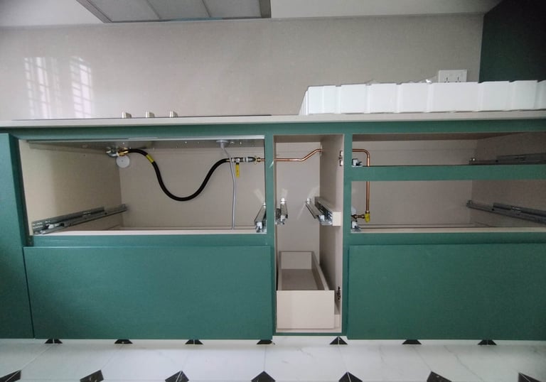 a kitchen showcasing gas pipeline connections