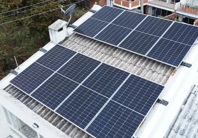 Residential rooftop solar panel installation for sustainable renewable home energy.
