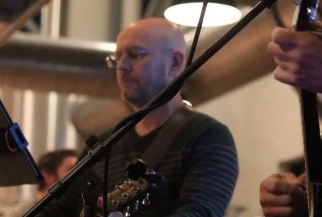 William Finn from Finn's Echo performing in front of live audience
