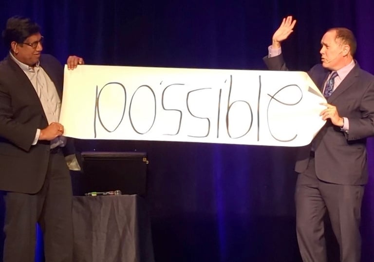 Bay Area mentalist David Martinez reveals a prediction during a trick on stage at a corporate event