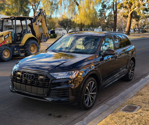 Black sedan gleaming after high-quality mobile car detailing in Las Vegas