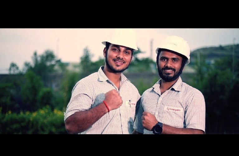 two men in hard hats