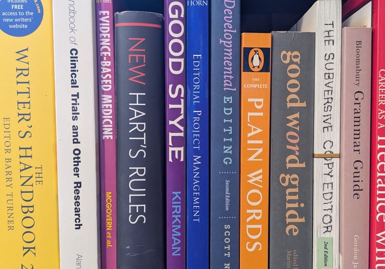 Editorial books on a shelf