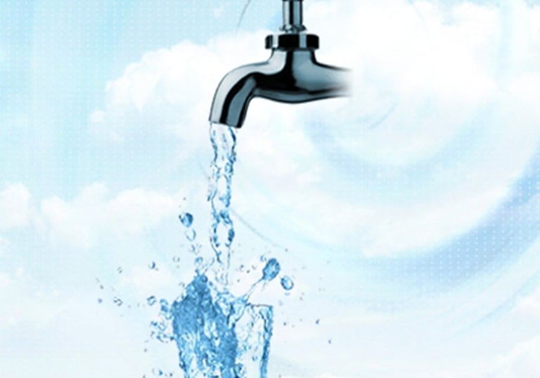 water pouring out of a faucet