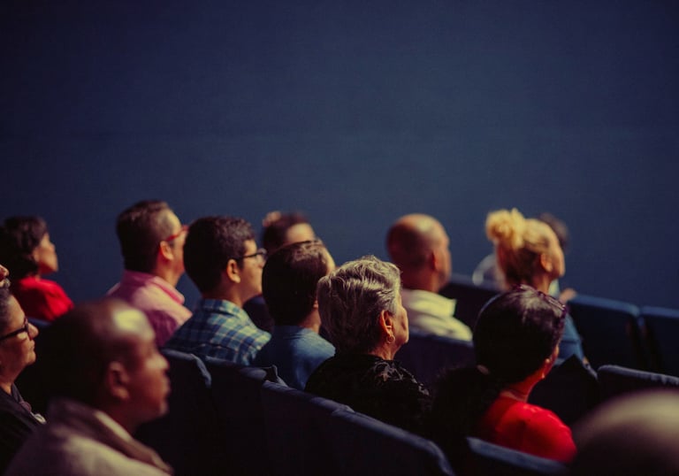 A Group of People Attending a Corporate Conference 
