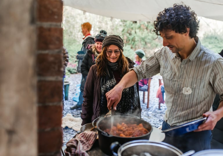 Tom otter from nomad serving food