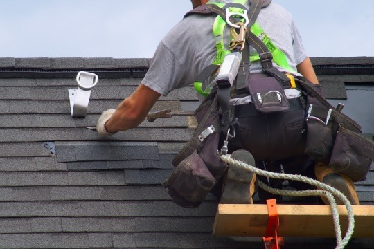 503 ROOFERS doing a roof repair of damaged shingles and sealing leaks on home roof