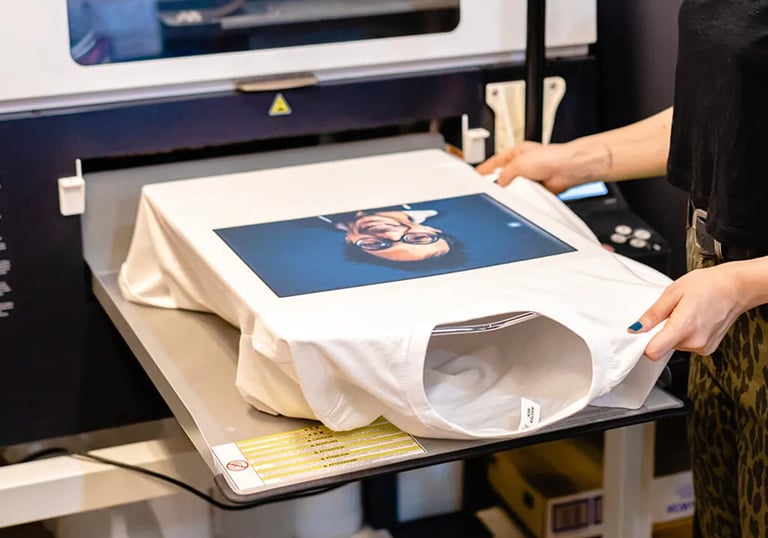 a woman is holding a large print of a photo of a woman in a leopard