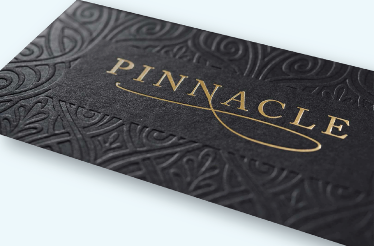 a business card with a gold foil foil stamping on it