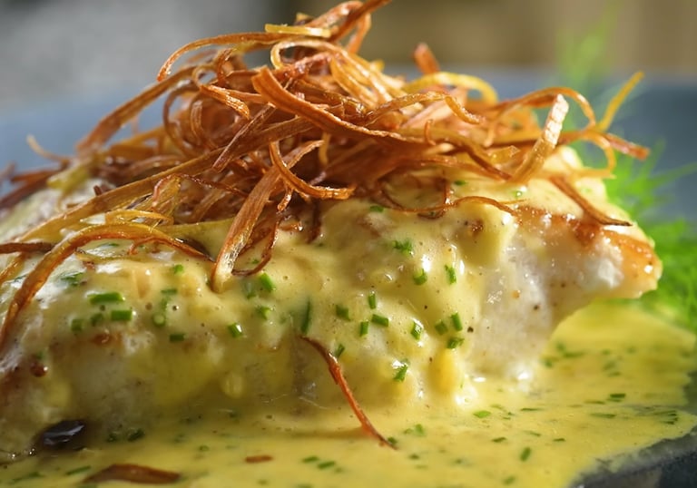 Pan-Seared White Fish with Crispy Leek and Hollandaise Sauce