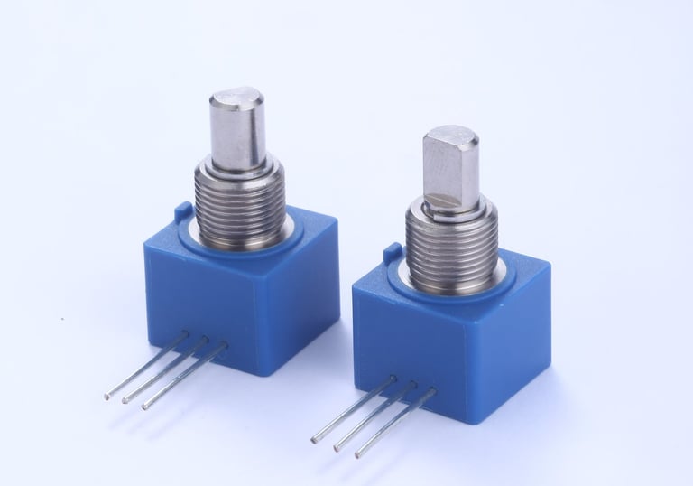 two small blue switches with a small one on the other