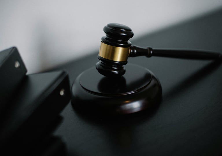 an anvil sits on the desk of a professional well versed with law