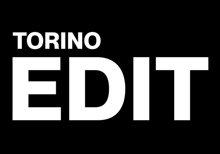 Torino EDIT minimalist typography logo featuring white sans-serif text on a solid black background.