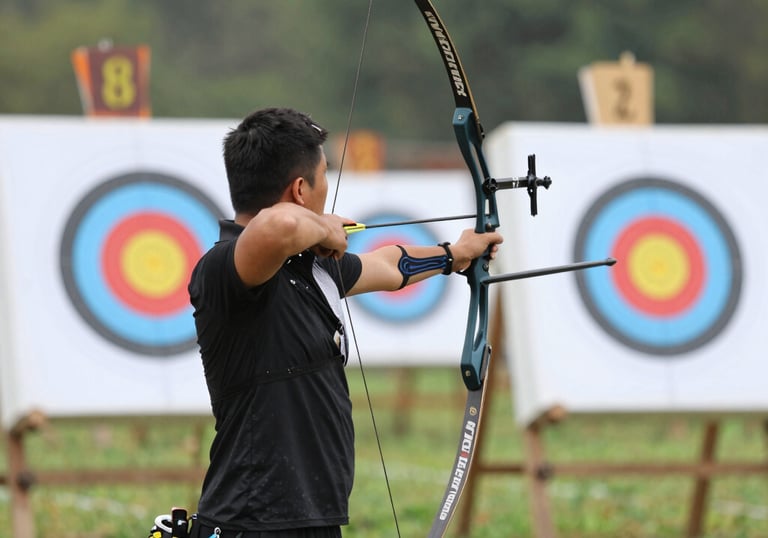 A person smiling while checking their phone, feeling accomplished and motivated.