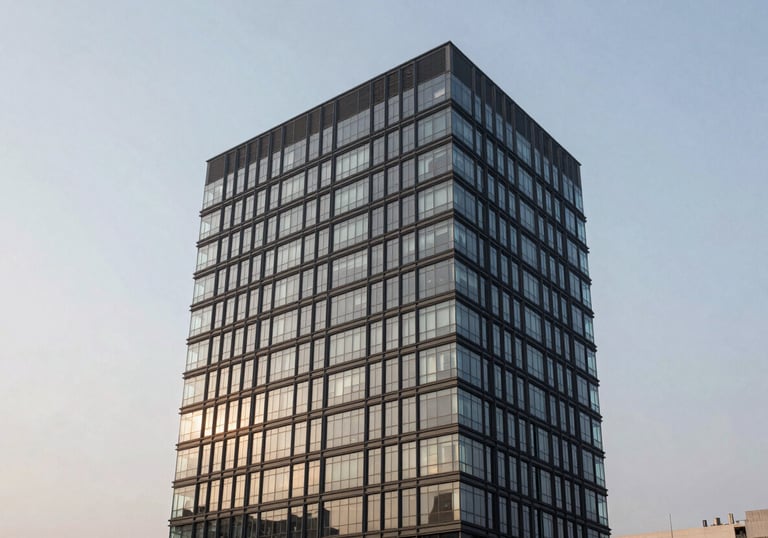 A modern and accessible office building in a Latin American / Spanish city city, clean architecture, pale mist sky, professional photography, high contrast.