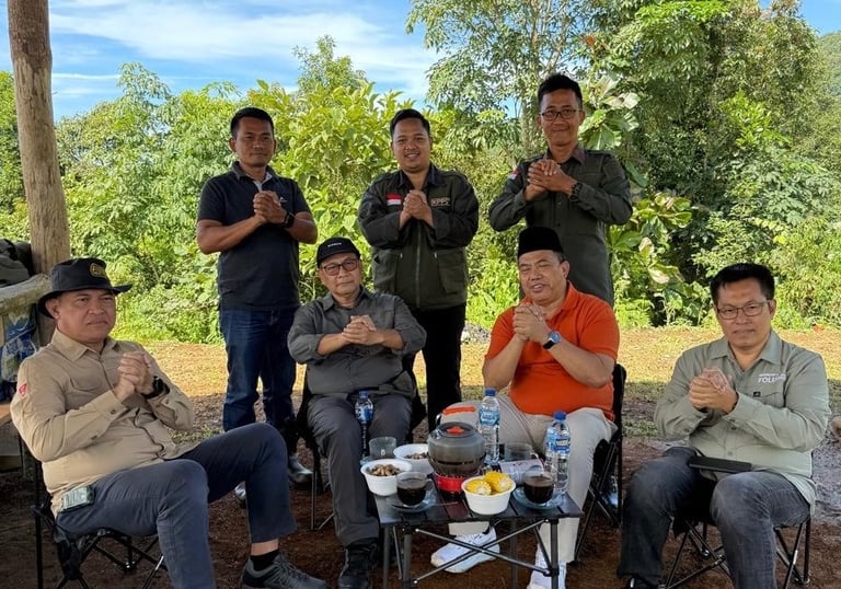 a group of people sitting around a table
