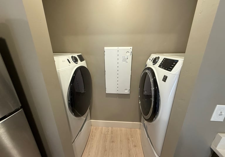 Compact laundry setup with front-loading washer and dryer – Cherry Home Service appliance installati