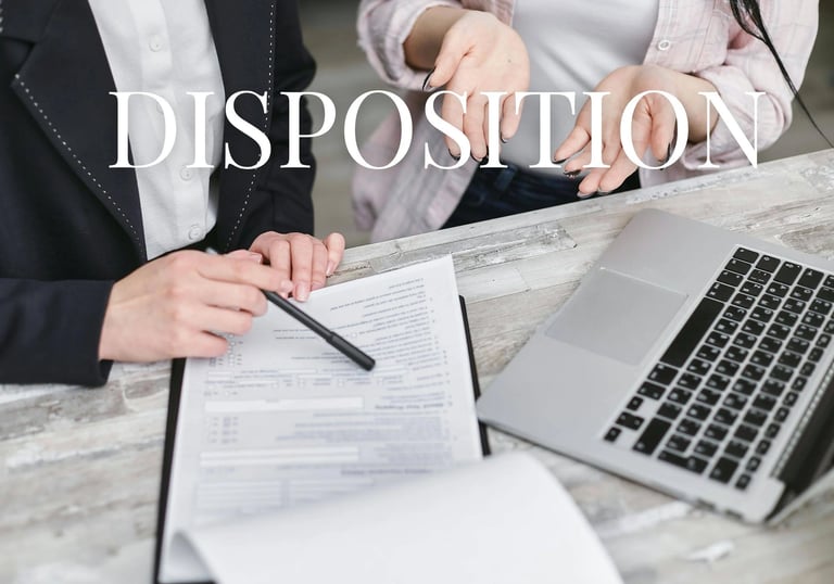 a man and woman sitting at a desk with a lap - KamBri Solutionstop