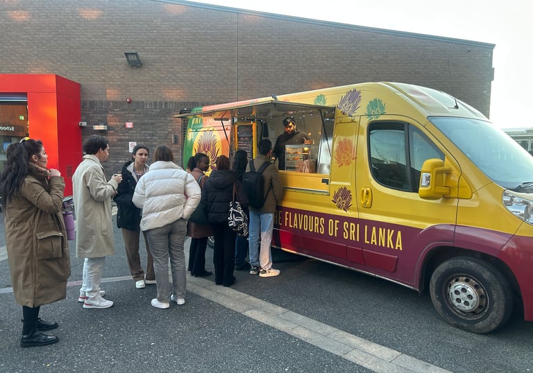 Sri-Licious food van with a queue