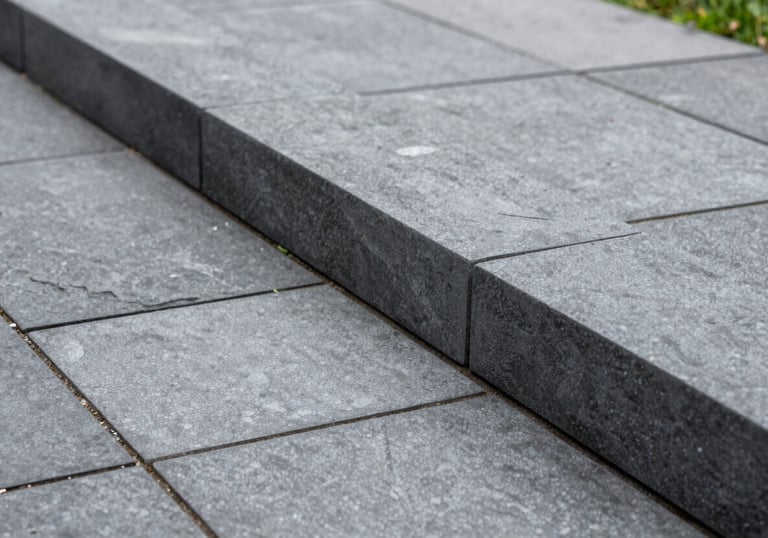 Detailed shot of high-quality garden edging and clean pressure-washed stone in a Oceanic / Australian (Victoria) patio.
