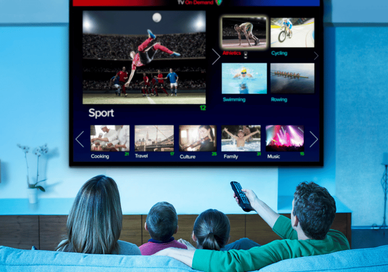 a family watching tv on tv