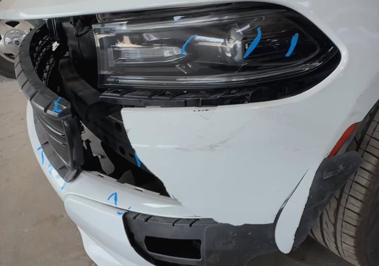 Crashed Dodge Charger at CarGo Collision Center Houston Auto Bodyshop