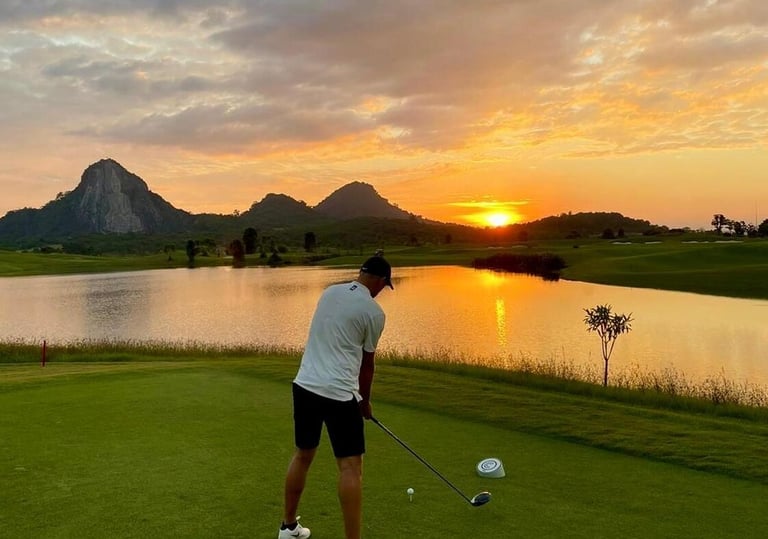 Man on golf course in Thailand holiday curated by Francesco Luxury Travels Villas Weddings