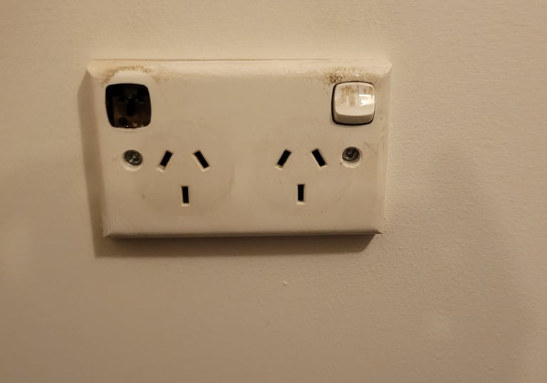 a close up of a damaged power point