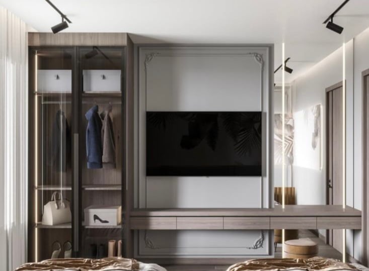 a bedroom with a tv and a bed in the middle of the room Nour Nagy Designs
