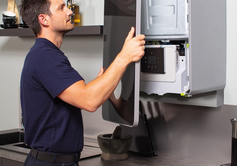 boiler during a breakdown repair, diagnosing and fixing issues to restore heating and hot water