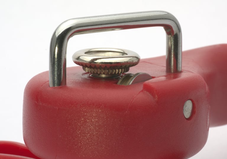 Close up of a tin opener.