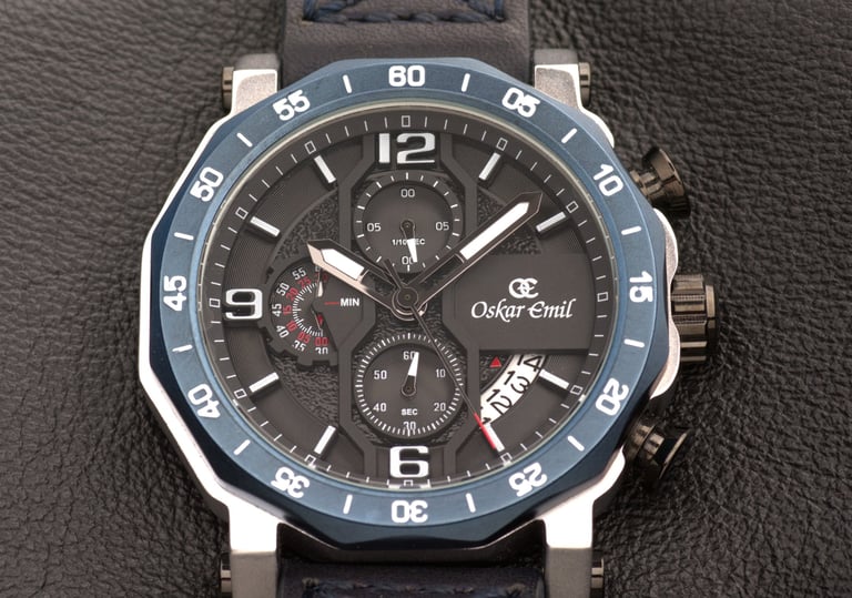 Watch photography image of the face of a watch in close up on a leather background.