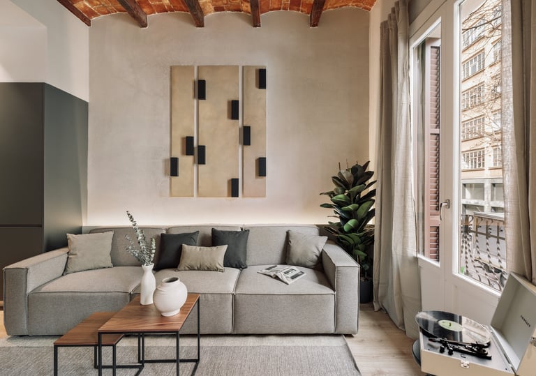 Contemporary Living room with custom art panels, minimalist furniture, neutral tones interior design