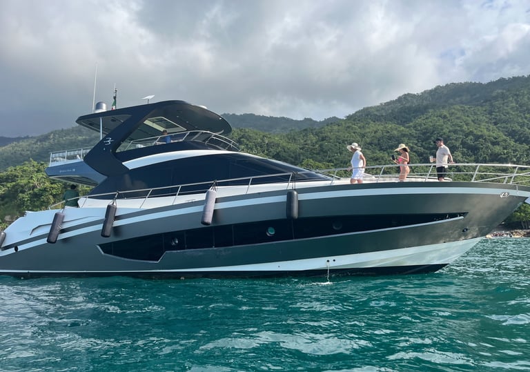 a boat 70 ft with people on it in the water