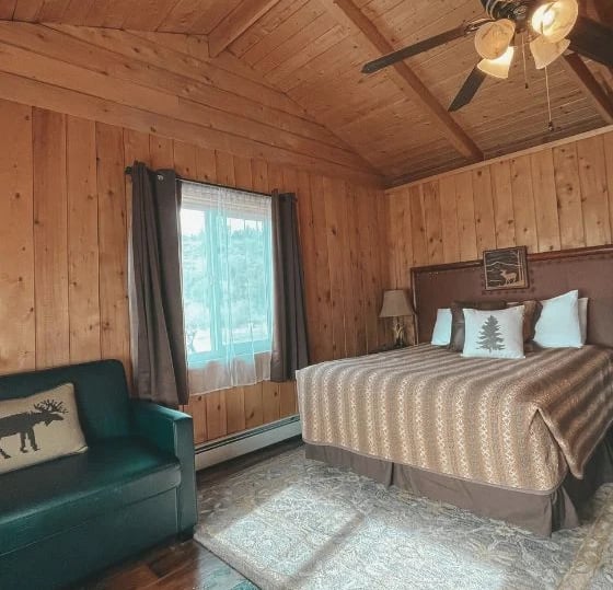 room 1 interior with bed and twin sofa bed