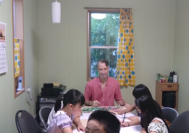 students and teacher in a home classroom