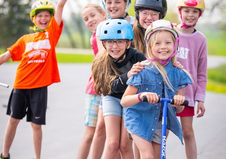 a group of children's skateboarders on a skateboard