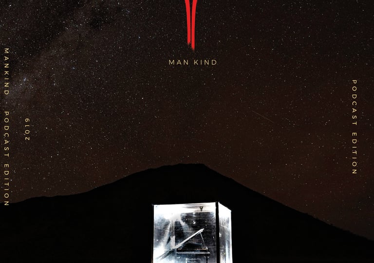 a man in a cube playing a grand piano in front of a mountain