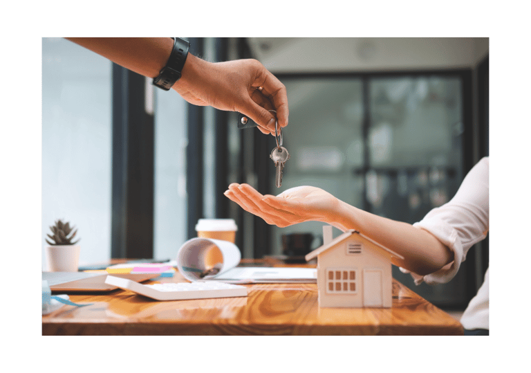 a person handing a keychaik to a house