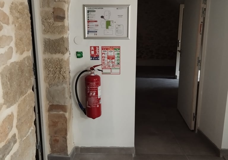 Pose du plan d'évacuation, plan d'évacuation