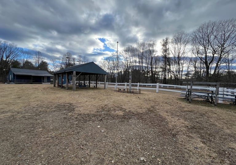a horse arena and a clubhouse