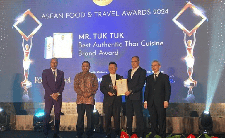 Mr Tuk Tuk Receiving an award for the Best Authentic Thai Cuisine Brand Award 