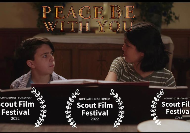 a woman and a man sitting at a piano